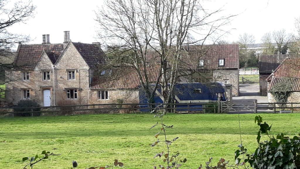 Green space in front of Keyword Farmhouse